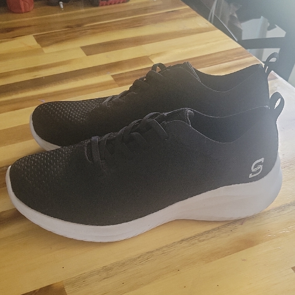 Skechers Black Sneakers with White Soles